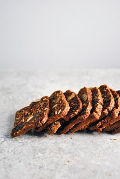 five pieces of bread sitting on top of a white countertop next to each other