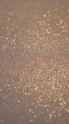 a close up view of some glitter on a surface that looks like something out of space