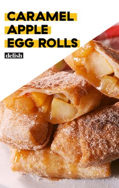 an advertisement for caramel apple egg rolls on a white plate with powdered sugar