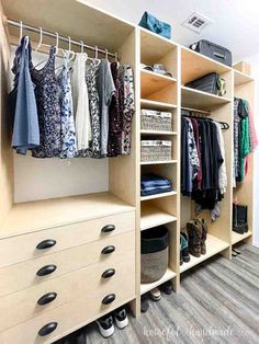 an organized closet with clothes and shoes