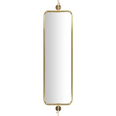 a gold framed mirror hanging on a wall