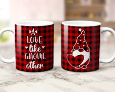 two coffee mugs sitting on top of a marble counter with the words love like gnome ate