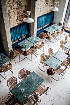 an empty restaurant with tables and chairs