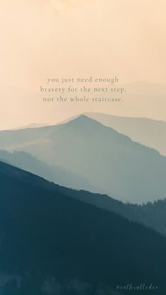 mountains with trees in the foreground and an inspirational quote