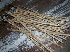 some sticks are laying on the floor and ready to be used as decorations or crafts