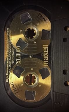 the inside of a black and gold dvd case