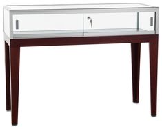 a glass and wood console table with drawers