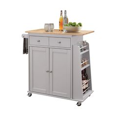 Add storage space and charm to your kitchen with this Tullarick wheeled kitchen cart. The stylish gray finish and natural wood top along with silver handles and pulls make this cart an adorable addition to cottage, contemporary or beach decor schemes. This modern kitchen island cart features ample storage for all your cooking needs with shelves, drawers, a condiment rack and towel rack. Some Assembly Required.Product Features Wooden Top 2 Doors 2 Drw Caster Wheels Spice & Towel Rack Drawer: Glide Side Metal, Dovetail Not Included, Felt-Lined Not Included, Safety Stop Included Case: 1Pc/1Ctn Finish: Natural & Gray Style: Modern & Contemporary Materials: Wood, Composite Wood Tullarick - Kitchen Cart - Natural & Gray35.0"W x 18.0"D x 34.0"H - 68.0 lb Dapur Moden, Portable Kitchen Island, Island Cart, Rolling Kitchen Island, Kitchen Island Cart, Portable Kitchen, Modern Kitchen Island, Kitchen Drawer, Kitchen Roll