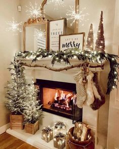 a fireplace decorated for christmas with stockings, stockings and garlands on the mantel