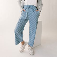 Keep it cool in our Blue Checker Audreys! Featuring a high-waisted 3 inch waistband and a cropped leg for ultimate comfort and confidence. Our Audrey Pants have never looked, or felt, so good! Wide-legged Slightly cropped length 3" Waistband with adjustable drawstring Front & back pockets Available in tall and petite sizes INSEAMS: Petite is 2" shorter and tall is 2" longer than regular inseams. XXS - 23.5" XS - 24" S - 24" M - 24" L - 24.5" XL - 24.5" XXL - 24.5" Rich Girl Fashion, Albion Fit Swim, Albion Fit Swimsuit, Albion Fit, Keep It Cool, Maternity Swimsuit, Travel Pants, Pants Blue, Swim Skirt