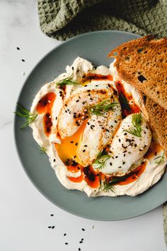 a plate with eggs and bread on it