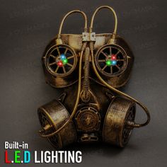 a steampunk mask with two lights on it's face and the words built - in led lighting