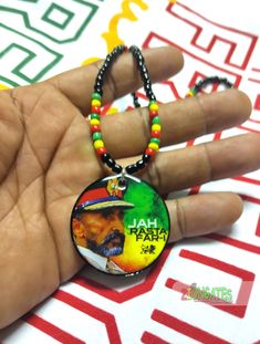 Introducing...the ultimate accessory in recognition of Haile Selassie with these beaded necklaces in iconic red, yellow and green Ethiopian colors! These Rasta-inspired chains will add a touch of cultural vibes to any outfit. Get your Rasta bead neck chain today and show off your love for the King of Kingz, His Imperial Majesty Haile Selassie I in style! Elevate your style with these Selassie I Necklaces, Featuring a 24 inch colorful Red, Yellow and Green Rasta chain with screw closure, The roun Small Pendants, Haile Selassie, Bead Necklaces, Neck Chain, Small Pendant, Yellow And Green, Beaded Chain, Beaded Necklaces, Red Yellow