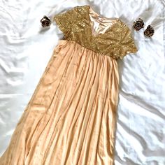 Nwt, Sparkly Top, Double Lined Gown. Sparkle Falls Just Under Breast. Skirt Part Measures 37.5”. Under Bust Measures 15.5” Across But Is Elastic So It Will Stretch If Needed. Sparkly Top Measures 11” From Top Of Shoulder/Neckline To Elastic Part. Gold Maxi Dress For Bridesmaids, Gold Flowy Dress For Party, Spring Gold Floor-length Maxi Dress, Flowy Gold Dress For Party, Gold Flowy Party Dress, Gold Maxi Dress For Spring, Spring Sequin Maxi Dress With Short Sleeves, Gold Flowy Dress For Spring, Flowy Gold Dress For Spring