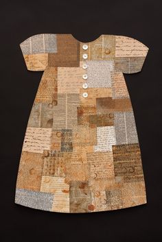 an old patchwork dress with buttons on the front and back, made out of fabric