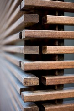 the wooden slats are lined up against the wall