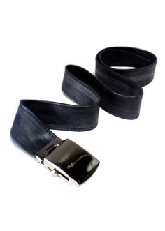 two black leather belts with metal buckles on each side, one is empty and the other has no belt