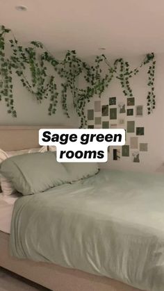 a bed sitting in a bedroom next to a wall with green tiles on it and the words sage green rooms