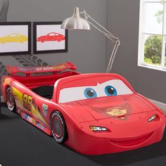 the cars bed is made to look like lightning from disney pixar's movie