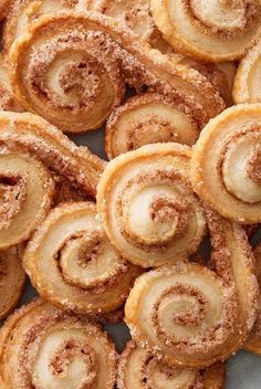 cinnamon rolls are piled on top of each other