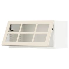 a white shelf with several shelves on it