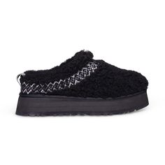 UGG TAZZ UGG BRAID BLACK SHEEPSKIN PLATFORM WOMEN'S SLIPPERS SIZE US 10/UK 8 NEW UGG WOMEN'S TAZZ UGGBRAID MULE CURLY SHEARLING BLACK PLATFORM SLIPPERS NEW 100% AUTHENTIC COLOR: BLACK SIZE: US 10/UK 8/EU 41 STYLE: #1143976 MSRP: $140.00 Style your look in the warm and plush UGG® Tazz Braid slippers with ankle-length silhouette and 10mm UGGplush™ upcycled wool and Lyocell® vamp lining. FEATURES 10mm curly sheepskin upper. 10mm curly UGGplush™ 80% upcycled wool, 20% Lyocell® insole. Slip-on style. Round toe construction. EVA midsole. SugarSole™ EVA outsole. Artificially dyed and treated, real fur from sheep originated from Australia, Ireland, the United Kingdom, or the United States. Imported. 100% GUARANTEED AUTHENTIC. I BUY DIRECTLY FROM UGG FACTORY STORE. Inside size tag has a red mark to Tazz Ugg, Ugg Tazz, Cozy Boots, Black Slippers, Platform Slippers, Black Platform, Women's Slippers, Womens Uggs, Fun Bags