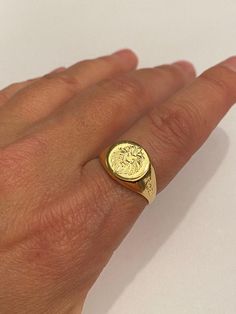 "Lion Signet Ring - Pinky Ring - Men / Women Engraved Ring - Family Crest - Personalized Ring - Best quality 18k Gold Plate Special engraving technique using which create the appearance of crest or other images of your choice. Seal Diameter: 12mm Please note in the \"notes to seller\" at checkout. : * your ring size * letter / picture / name/s / Sentence / Inspiration / Drawing / crest - you want me to engrave If you have any questions please feel free to contact The product will arrive to you p Vintage Tarnish-resistant Round Rings, Vintage Engraved Round Ring, Tarnish Resistant, Adjustable Round Signet Ring, Adjustable Round Signet Ring Stamped 14k, Adjustable Round 14k Stamped Signet Ring, Lion Signet Ring, Mens Gold Signet Rings, School Girlfriend, Wax Seal Ring