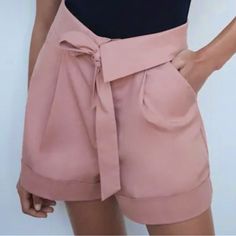 Nwot Zara Pink Marl High Waisted Shorts W/ Bow Size: Xs Color: Rose/Pink Excellent Condition. New Without Tags Belt Is Attached Brand New Zara Shorts W/ Bow Trf In Pink Marl High-Waisted, Self Tie Shorts W/ Foldover Waist, Side Pockets, Back False Welt Pockets & Cuffed Hem Front Zip W/Metal Hook Closure Mixture Of Cotton (97%) & Elastane (3%) Length: 15” Waist: 12.5” Rise: 12” Inseam: 2.5” 97% Cotton 3% Elastane Smoke Free Home Ships Same Day Or Next Business Day Bundle And Save! Open To Reasona Chic High-waisted Shorts In Solid Color, Chic High-waisted Solid Color Shorts, Fitted Pink Shorts With Pockets, Casual High Waist Pink Shorts, Pink Shorts With Pockets And Short Inseam, Chic High Waist Shorts With Waistband, Chic High Waisted Shorts With Waistband, Chic High Waist Shorts, Summer Pink Bottoms With Pockets