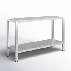 a white table with two shelves on each side