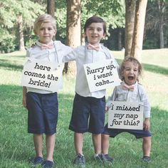 three children holding signs that say, here comes the bride and missed my nap for this?