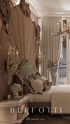 a bed room with a neatly made bed and a chandelier