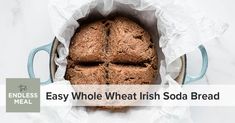 a loaf of irish soda bread in a paper bag with the words easy whole wheat irish soda bread