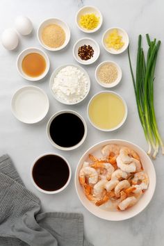 the ingredients to make this dish include shrimp, eggs, and sauces