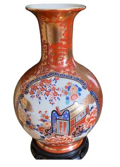 an ornate vase with colorful designs on it's sides and bottom, is shown against a white background