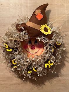 Enjoy the fall season with this cute scarecrow wreath. He features beige mesh combined with straw. Enhanced with hat and sunflower ribbon. The vinyl face is surrounded with clear 6-hour timer lights. AA batteries included. Size: 22 x 26 x 4 Care: Perfect for any room to decorate for the season or between 2 doors. Shipping: Wreath will ship with a clear protective bag and tied down to prevent movement during shipping. Upon arrival fluff ribbon if necessary. Policy: Returns not accepted. Scarecrow Decor, Lighted Wreath, Scarecrow Face, Lighted Wreaths, Scarecrow Wreath, Fall Scarecrows, Autumn Wreath, Wreath Fall, Autumn Wreaths