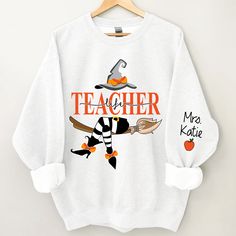 Personalized Teacher Life Witch, Custom Teacher Name Halloween, Gift For Teacher TH Sweatshirt Suitable for many occasions such as Christmas, Father's Day, Mother's Day, birthday This classic crew-neck sweatshirt is an essential basic item for anyone’s wardrobe. The ribbed cuffs on the sleeves and waist are reinforced, and the high-quality cotton ensure that anyone will enjoy this cuddly and cool sweatshirt for many moons to come. Preshrunk fleece knit Double-needle stitching at shoulder, armhol Grandma With Grandkids, Witch Sweatshirt, Aunt Life, Witch Halloween, Holiday Sweatshirt, Aunt Gifts, Halloween Sweatshirt, Mom Kid, Embroidered Sweatshirts