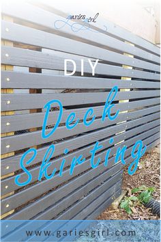 a wooden slatted fence with the words diy decking written on it