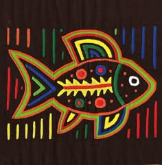 a colorful fish painted on a black background