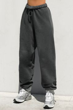 Front view of model from the waist down wearing the oversized loose fit washed black french terry Oversized Jogger with an elastic waistband and ankle cuffs Sweatpant Outfits, Oversized Joggers, Black French, Terry Fabric, Cute Comfy Outfits