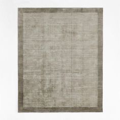 an old rug is shown in grey and beige colors, on a white background with a gray border