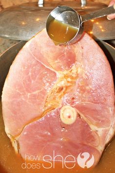 ham being cooked in a frying pan with a ladle