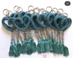 several key chains with tassels attached to them