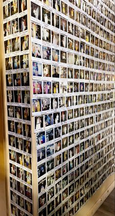 a wall covered in photos and pictures on it