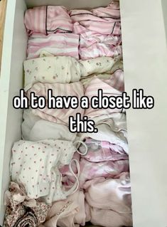 an open box filled with baby clothes that says oh to have a closet like this