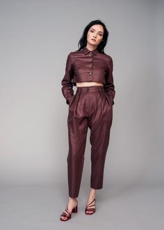 Introduce both a new color and texture to your wardrobe with the IRA LYSA Merlot Linen Pants. Reach for these Chocolate or Burgundy color linen pants when completing your next sleek look. Tired of wearing black all the time? Spice it up with an earth tone and a high-waisted easy silhouette. Go from the office to an evening stroll with ease in these pants. The styling options are endless and the color flattering. * Pegged pants* High rise with belt and loops* Pockets* Deep pleats on the front* Cr Pegged Pants, Peg Pants, Easy Silhouette, The Ira, Fashionable Dresses, Lace Trim Blouse, Reversible Top, Spice It Up, Black Spaghetti Strap