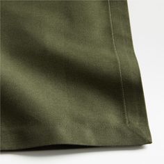 the back side of an olive green pants