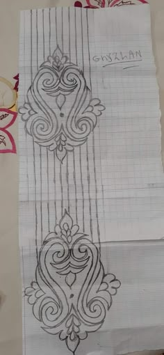 a piece of paper with some designs on it