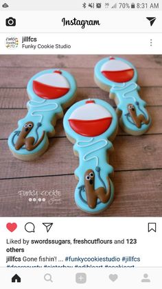 three cookies decorated to look like cartoon characters