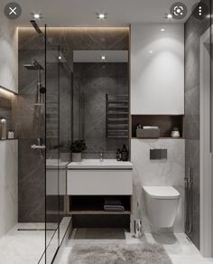 a modern bathroom with marble walls and flooring