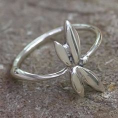 Slender and sleek, a beautiful dragonfly graces this band ring from Guillermo Arregui in Mexico. The ring is crafted from polished Taxco sterling silver. Beautiful Dragonfly, Dragonfly Ring, Metalsmithing Jewelry, Baroque Art, Sterling Silver Rings Bands, Silver Band Ring, Sterling Silver Bands, Silver Band, Band Ring